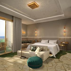 拉巴特Four Seasons Hotel Rabat at Kasr Al Bahr的一间卧室配有一张大床和一张沙发