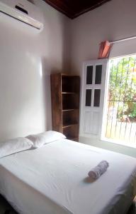 Ribeirinhos Hostel客房内的一张或多张床位