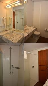 阿蒂巴亚Atibaia Residence Hotel & Resort的一间带水槽、淋浴和卫生间的浴室