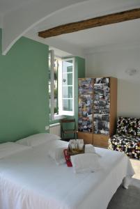 Al Piccolo Scoglio - Room & Breakfast客房内的一张或多张床位