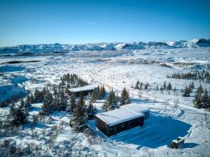 格拉法基尔恰Giljagisting的雪中房屋的空中景观