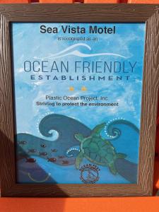 托普赛尔海滩Sea Vista Motel的海龟的海洋友好建筑图片