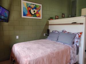 Tiny House Perfeita para Casais客房内的一张或多张床位
