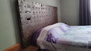 Hospedaje Leñas del Tolosa客房内的一张或多张床位