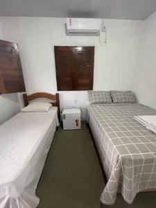 Sítio Paraíso do Caju客房内的一张或多张床位