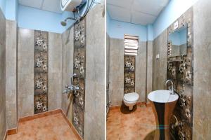 kolkataFabExpress Laxmi Inn的带淋浴、卫生间和盥洗盆的浴室