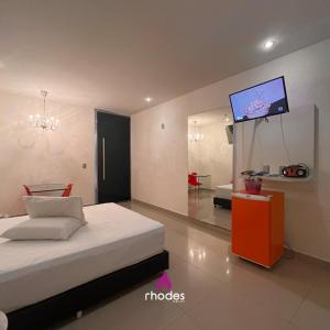 Rhodes Hotel Caruaru客房内的一张或多张床位
