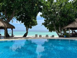 丽贝岛东塔莱利佩海滩度假酒店的享有海滩景致的游泳池