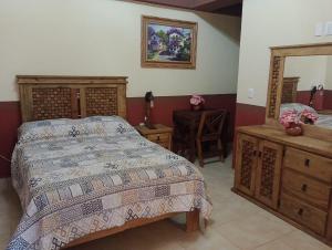 Hotel Hacienda San José客房内的一张或多张床位