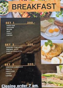 Phra Ae beachEden Lanta Bungalow的餐厅供应自助早餐的菜单