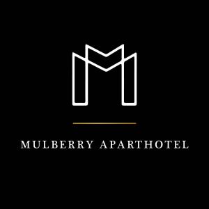 泰恩河畔纽卡斯尔Mulberry Aparthotel Newcastle Gateshead的带有黑色背景的字母m标识