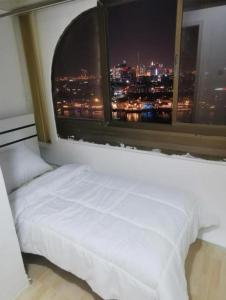 Cloud9 Premium Hostel客房内的一张或多张床位