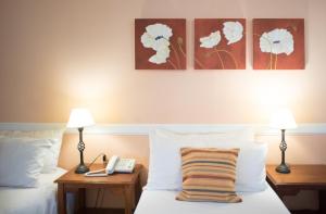 奥斯特拉尔乌斯怀亚酒店客房内的一张或多张床位