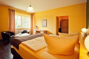 Alte Schlossbrauerei客房内的一张或多张床位