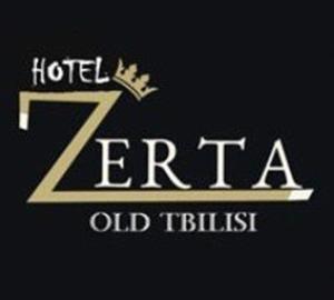 第比利斯Hotel Zerta Old Tbilisi的酒店旧变速器标志