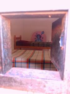 巴拉德瓦利扎斯Valizas 1900的卧室配有一张床,享有风景