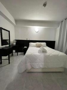 HOTEL BLUE COSTA Panama客房内的一张或多张床位