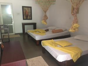 Holiday Inn Polonnaruwa客房内的一张或多张床位