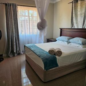 Mukamba Holiday House客房内的一张或多张床位