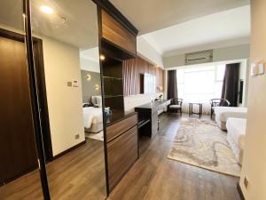 甲抛峇底Bertam Resort,Penang的酒店客房设有一间卧室和一间浴室。