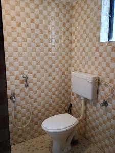 瓦加托GS Home Sea View Delux Room的一间带卫生间和淋浴的浴室