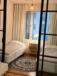 JATKASAARI-2 - Chic and cosy Sea side stay客房内的一张或多张床位