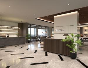 帕卢Aston Palu Hotel & Conference Center的一个带前台餐厅的大堂