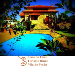 布拉加Casa do Faial - Braga的一张房子的照片,里面设有一个游泳池