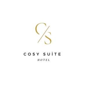 安塔利亚Cosy suites hotel的带有coxsyl酒店的字母标志