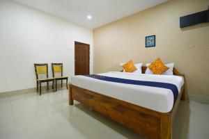 Royal Adwita Resort客房内的一张或多张床位