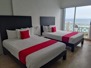 坎昆“Magic Sunrise at Cancun”的海景客房 - 带两张床