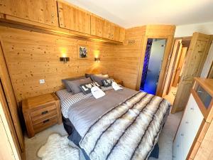 Chalet Flocon - luxury ski chalet by Avoriaz Chale客房内的一张或多张床位