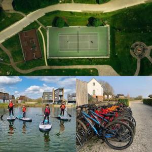 萨默福德凯恩斯Cotswold Cottage Sleeps 7 pool/sports/spa/walks的水中骑着自行车的人
