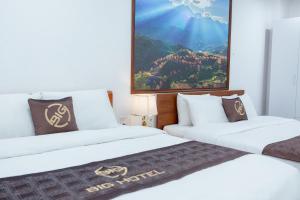 Big Hotel Lào Cai客房内的一张或多张床位