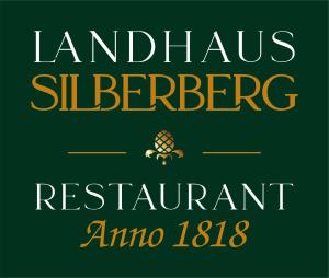 温特贝格Landhaus Silberberg的兰开夏郡一家可维持的餐馆的标志
