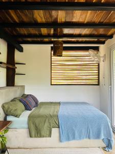 Agora at Playa Maderas - Surf House, Cabanas and Casitas客房内的一张或多张床位