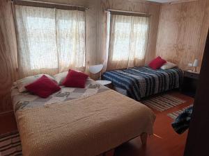 科伊艾科Ventisca Sur的一间客房内配有两张床的房间