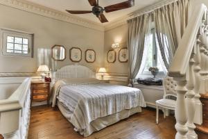 Villa Le Fontanelle客房内的一张或多张床位