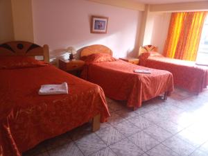 Hostal Cusco Inn客房内的一张或多张床位