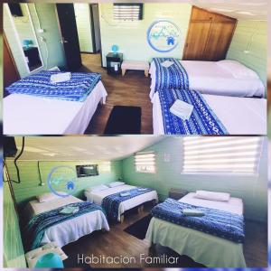 奥索尔诺Hostal Paradise Blue的两张带两张床的酒店客房的照片
