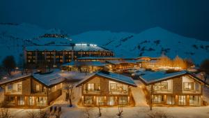 古多里古柯里马可波罗酒店的山间雪地度假村