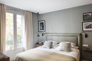 The Onsider - Luxury 3 Bedroom Apartment客房内的一张或多张床位