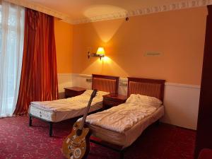 Royal Hotel and SPA Geneva客房内的一张或多张床位