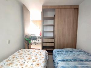 Hermoso Apartamento Estancia Tranquila por dias, semanas o meses客房内的一张或多张床位