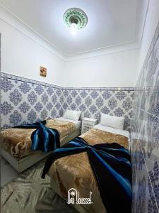 Hotel Dar Youssef 1客房内的一张或多张床位