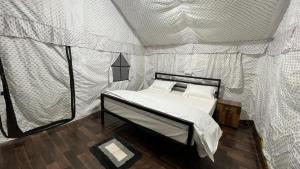 Sari Highlands客房内的一张或多张床位