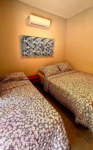 Pousada Pipa Soul客房内的一张或多张床位