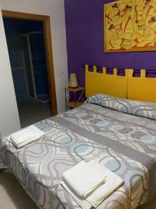 Hostal y Apartamentos la Vereda客房内的一张或多张床位