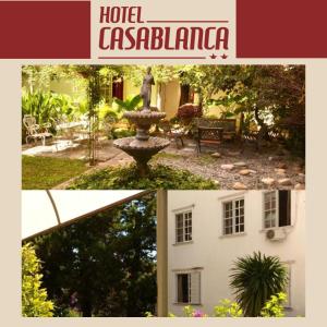 萨尔塔Hotel Nuevo CASABLANCA的房屋和喷泉照片的拼合物