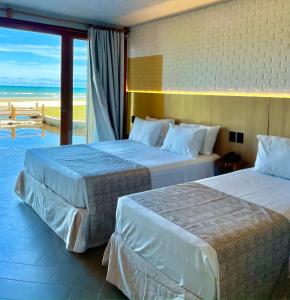 奥利文萨托罗罗姆芭度假酒店的海景客房 - 带两张床
